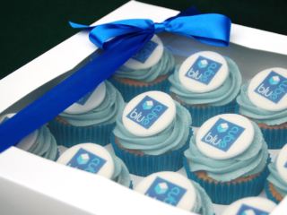 Corporate Blue Cube iced and boxed cupcakes