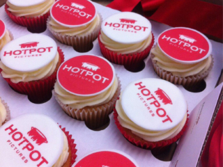 Boxed corporate hotpot iced cupcakes